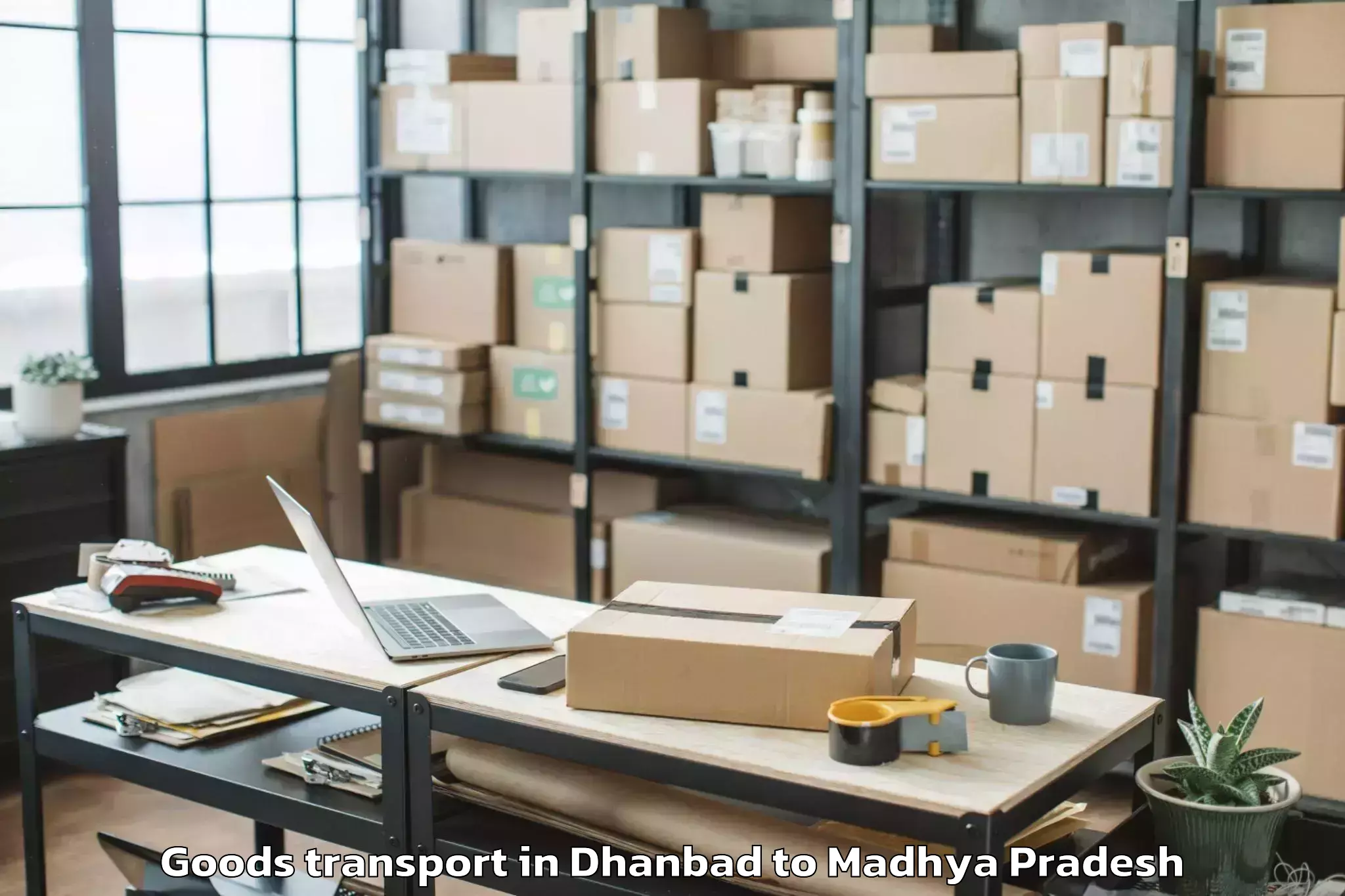 Book Your Dhanbad to Devi Ahilya Vishwavidyalaya In Goods Transport Today